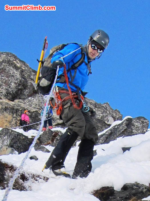 Unloading yaks in the snow in Ama Dablam basecamp. Photo Mark van 't Hof.