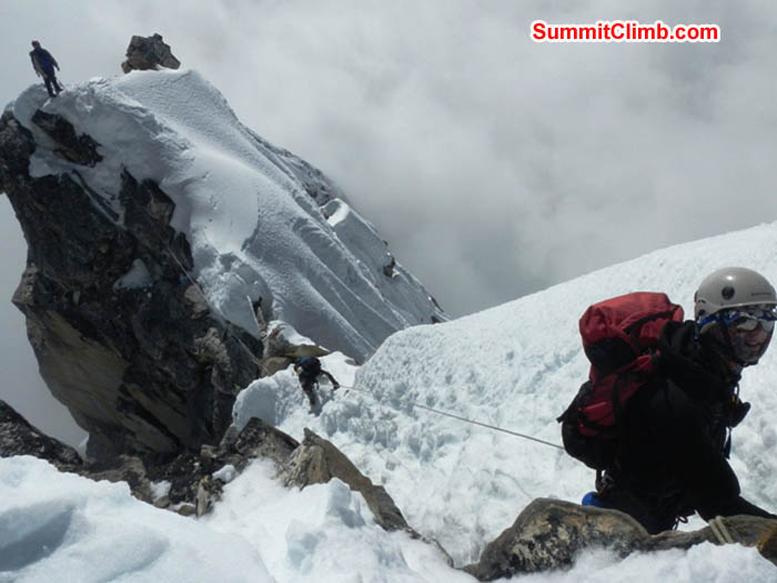 Crossing from the yellow tower to camp 2. Right to left - Jim, Maggie, and Jangbu. Photo Mark van 't Hof.