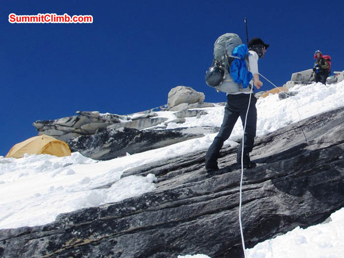 In camp 1, Tim abseils over a massive cliff while Jim watches in trepidation. Sarabjit Bhooee Photo.