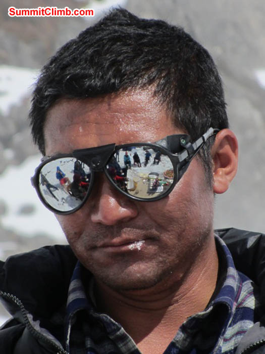 Jangbu Sherpa at the prayer ceremony. Mark van 't Hof Photo.
