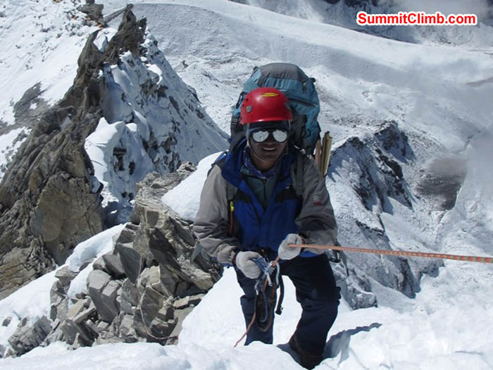 Jangbu Sherpa climbing a snowy ridge on the way to camp 2. Photo Sarabjit Bhooee.