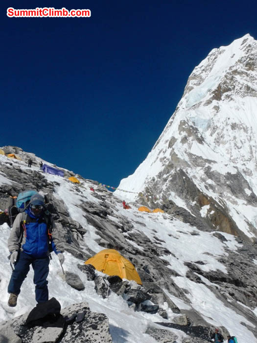 Jangbu Sherpa carrying a load in camp 1. Mark van 't Hof Photo.