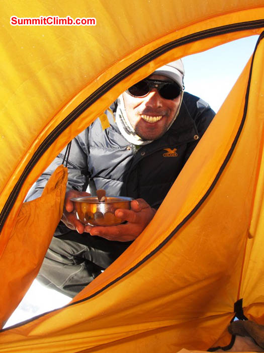 Tenji brings a delicious bowl of noodle soup to the tent in Camp 1. Sarabjit Bhooee Photo