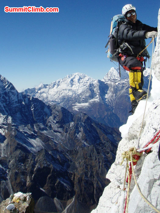 Gyelje Sherpa in the lower part of the grey tower. Checkout camp two on top of the yellow tower in the lower left. photo by Maaike Braat