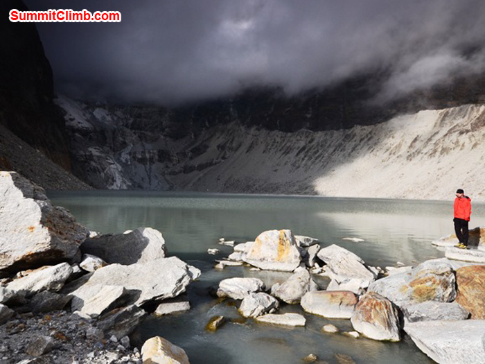 Milan Sramek (Slovakia) soaks up a twilight's last spears of sun at Tagnag Lake. Photo by Michael Moritz. 
