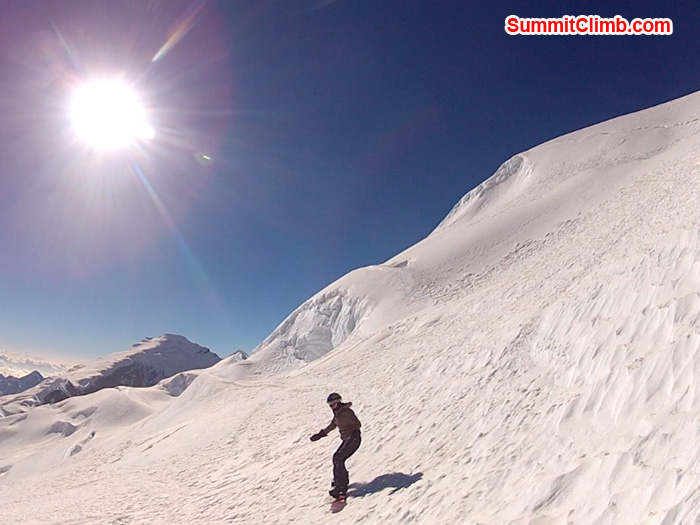 Holly Budge snowboarding down Mera Peak. Photo by Corne Deelen.