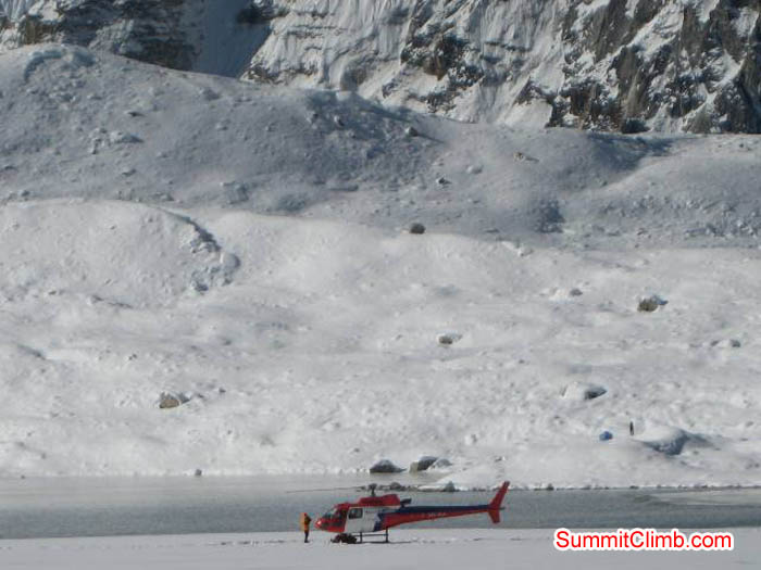 Helicopter rescue at Baruntse lake near basecamp. Jussi Kuva Photo.