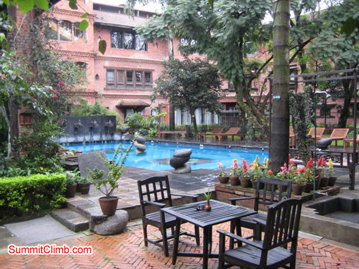 Comfortable table beside the pool at the Kathmandu Hotel. Jussi Kuva Photo.