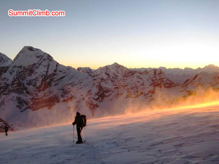 Descending from Mera Peak on a windy afternoon at sunset. Jussi Kuva Photo.