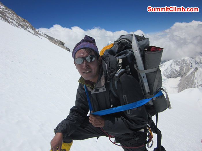 Sherpa from other group carrying expedition stuff at Camp 2. Photo John and Debbie.