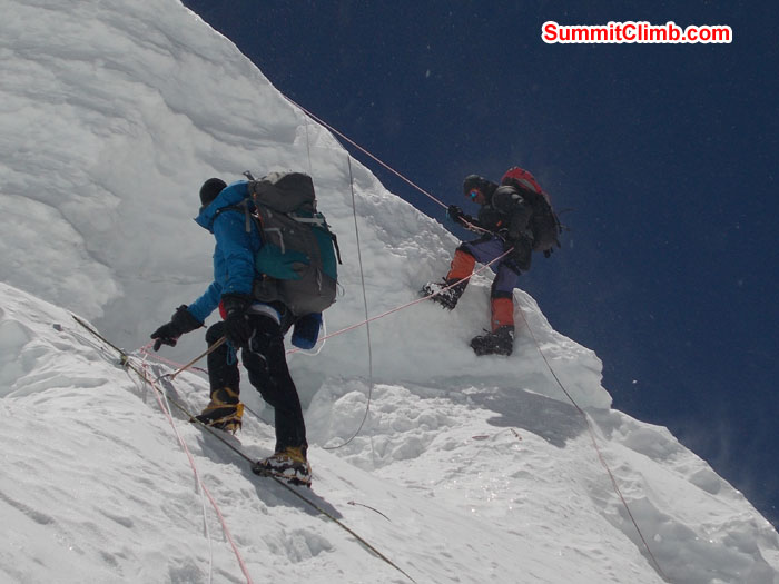 Overhang just below camp 2. Members using fixed ropes while coming down. Photo Wayne Herrick