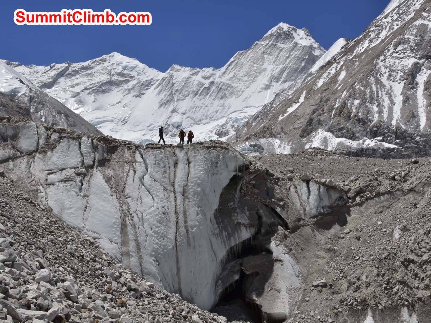 Climbers atop on ice wall in the moraine. Dmitri Nichiporov photo