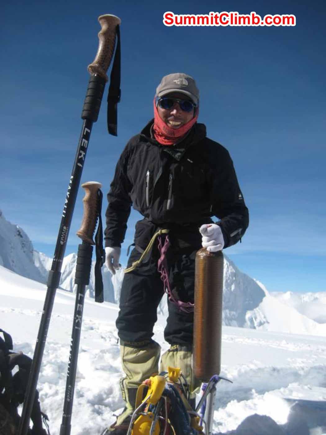 Tensing at camp 1 preparing oxygen to take to camp 2 - photo by Marina Cortes