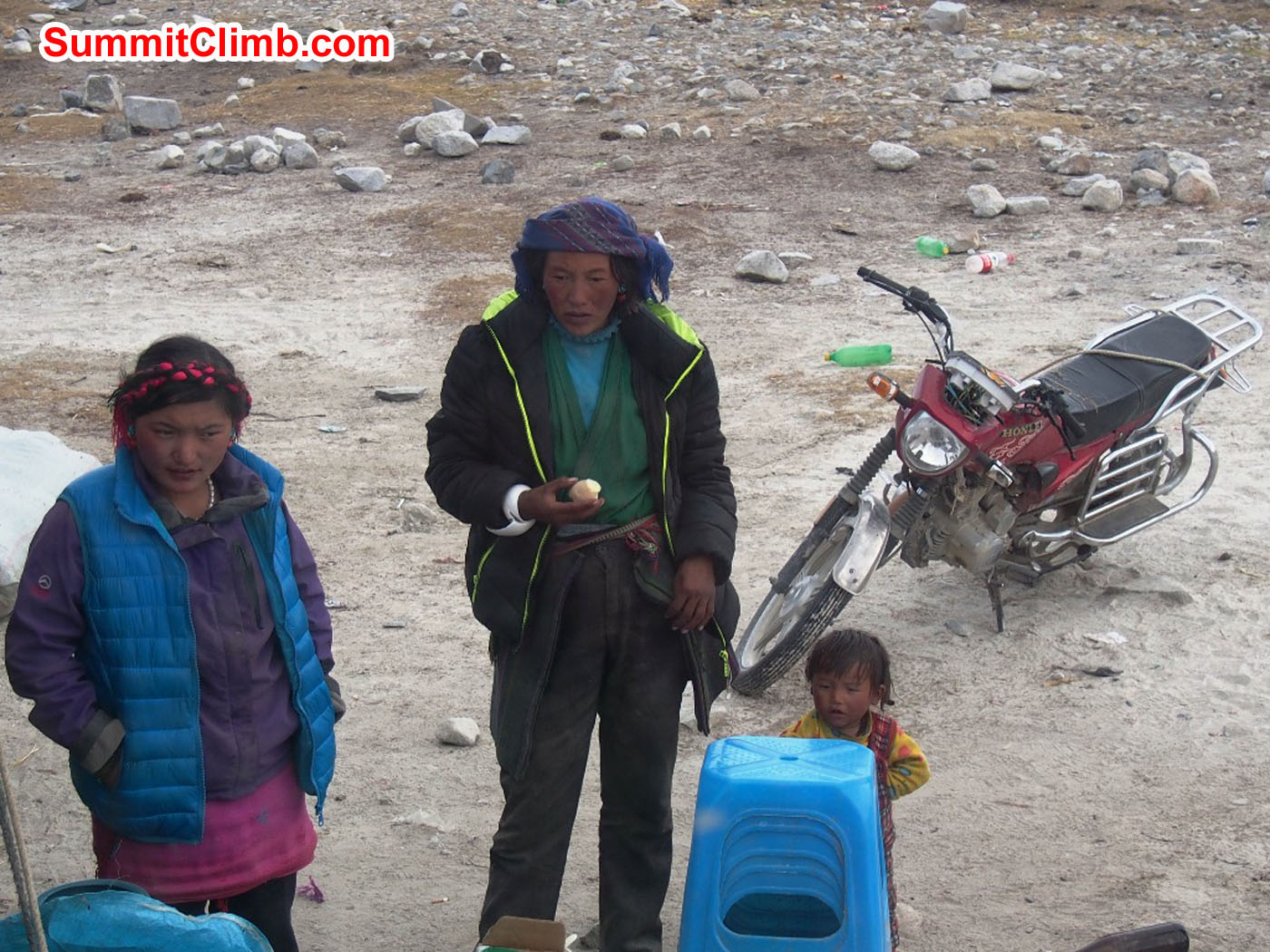 Local family looks after guests at interim camp. Alan Barclay Photo