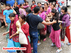 Expedition porters at Kodari preparing to receive equipment to take over the Nepal Tibet border,photo by Jurgen Landmann