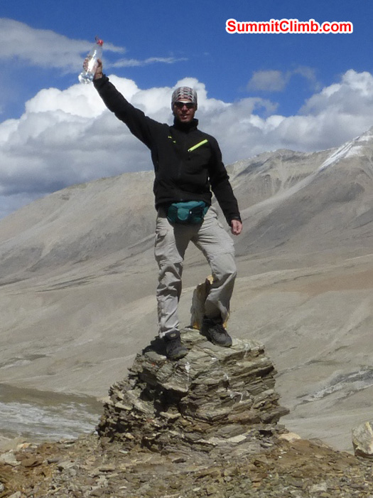 Juergen Landmann tops out on a 5600 metre high hill above basecamp. Photo by Matt Olsen