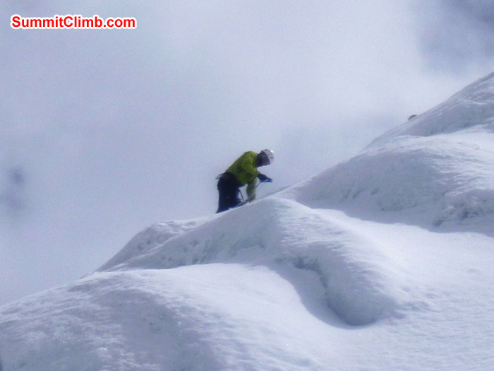 JJ climbs the ice pinnacle near basecamp during team ice training, Photo by Matt Olsen