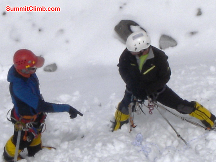 Matt and Juergen discuss abeil technique. Jangbu Sherpa Photo