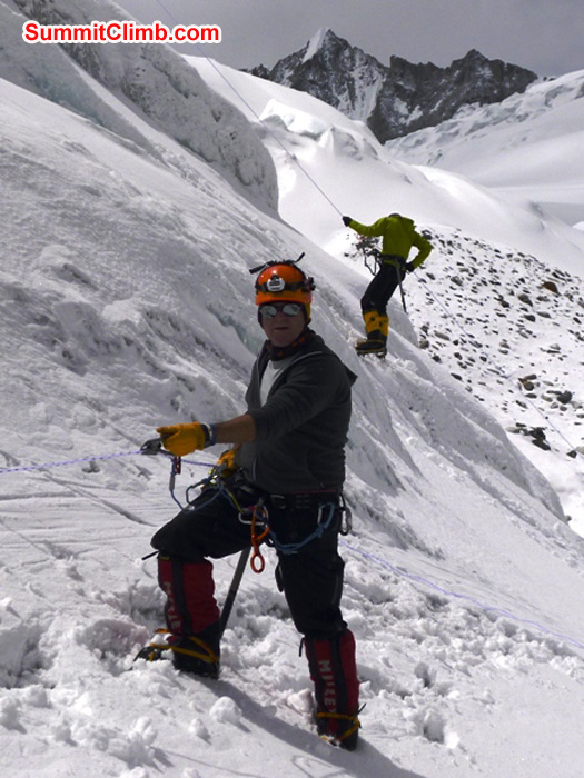 James climbs towards the camera as JJ abseils.Juergen Landmann Photo