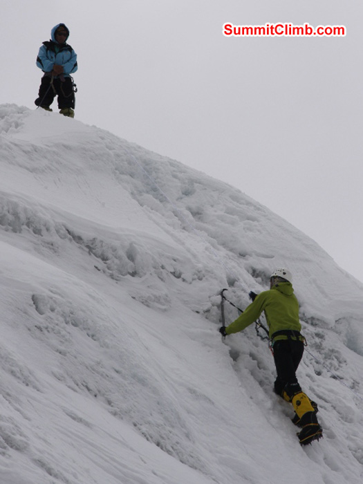JJ climbs ice while Jangbu Sherpa instructs during ice trainng in ABC. Matti Sunell Photo JJ climbs ice while Jangbu Sherpa instructs during ice trainng in ABC. Matti Sunell Photo