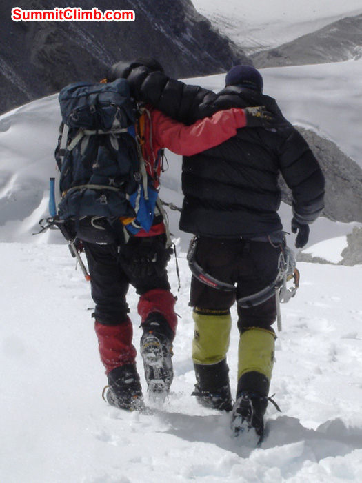 After the avalanche. Injured Sherpas from a different group, helping one another descend down to camp 1. Jangbu Sherpa Photo