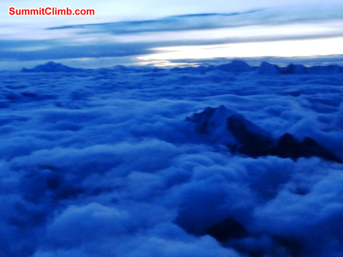 Looking out across Tibet on summit night. Mount Shishapangma in upper left, Mount Jobo Rabzang in lower right. Juergen Landmann Photo