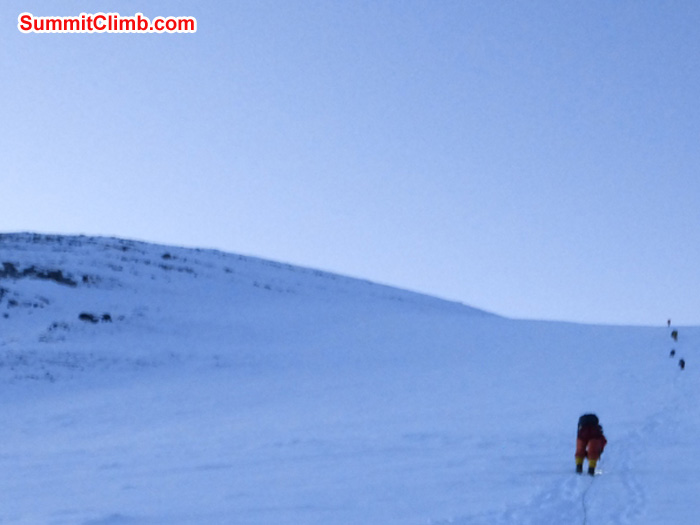 Climbers just below the summit plateau early in the morning. Juergen Landmann Photo