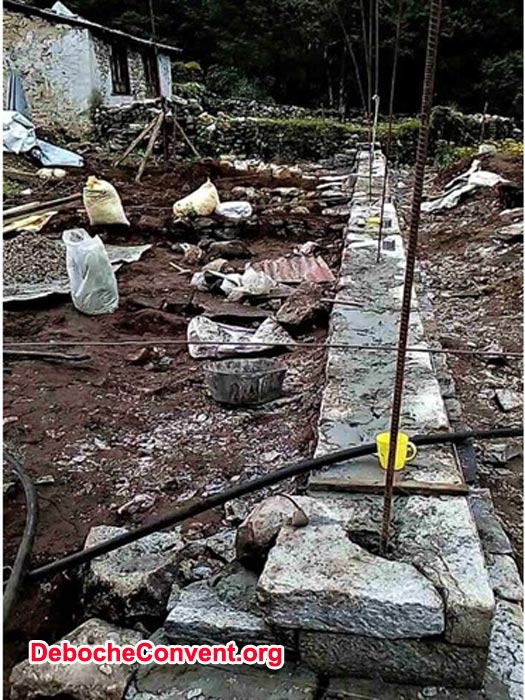 Foundation wall in place with rebar