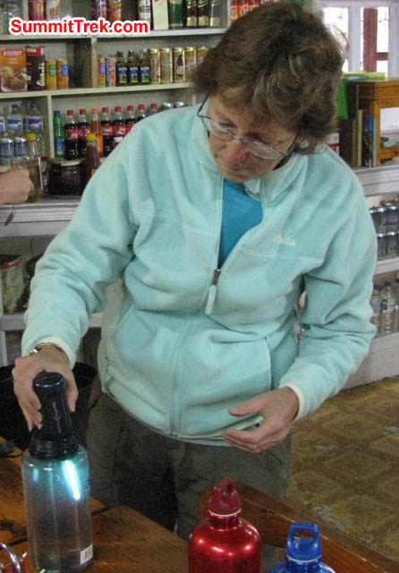 Dee Haberern treats her water with a Steripen. Ron Haberern Photo