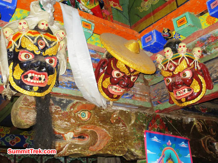 Masks and carved beams inside the Pangboche Gompa. The deity with the large ha on is caled Dorje Lakpa. Photo Hannah Rolfson. Masks and carved beams inside the Pangboche Gompa. The deity with the large ha on is caled Dorje Lakpa. Photo Hannah Rolfson.