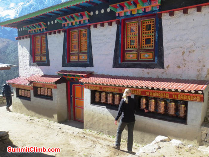 Hannah Rolfson spins prayer wheels at the Pangboche Temple. Brian Rolfson Photo