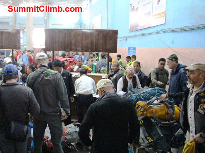 Team loading bags at the Lukla Airport. Photo by Sam Chappatte Team loading bags at the Lukla Airport. Photo by Sam Chappatte