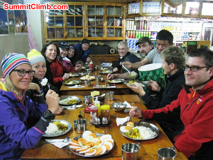 Delicious home cooked dinner at Green Village Lodge in Phakding. Left to right in photo - Anne-Mari, Violetta, Sandra, Chris, Michelle, Kieran, Don, Adam, Mingma, Monika, and Slavo. Scott Smith Photo
