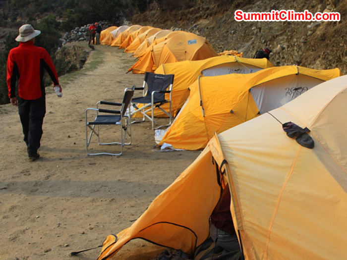 Slavo checks out the line of tents at the best camping in Namche at the Danfe Lodge. Monika Witkowska Photo. Slavo checks out the line of tents at the best camping in Namche at the Danfe Lodge. Monika Witkowska Photo.
