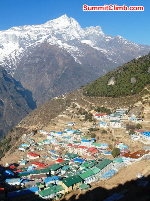 Namche Bazar village with beautiful Kwangde Ri mountain in the background. Monika Witkowska Photo. Namche Bazar village with beautiful Kwangde Ri mountain in the background. Monika Witkowska Photo.