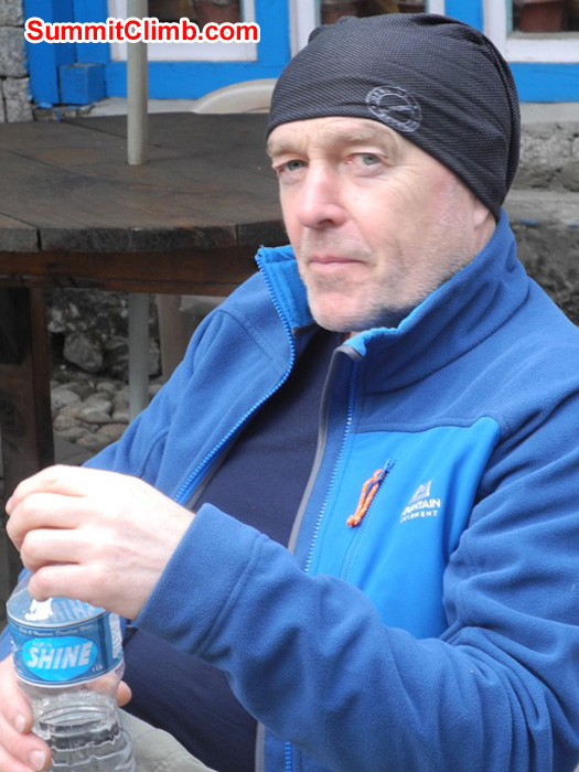 Kieran Lally, from Ireland, takes a short water break in Pheriche village. Violetta Pontinen Photo. Kieran Lally, from Ireland, takes a short water break in Pheriche village. Violetta Pontinen Photo.