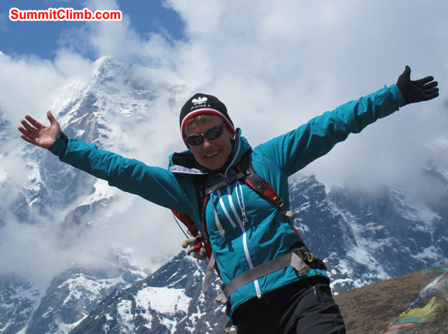 Monika Witkowska exhalts in front of Mount Cholatse. Violetta Pontinen Photo. Monika Witkowska exhalts in front of Mount Cholatse. Violetta Pontinen Photo.