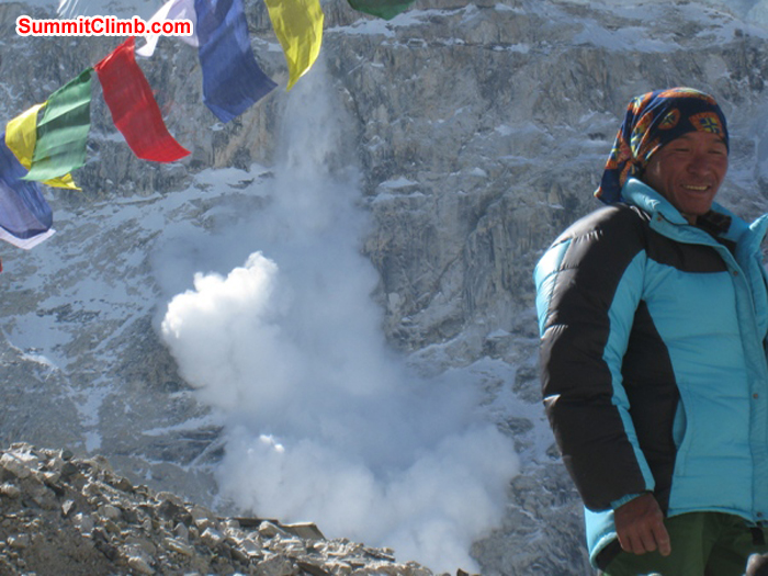 Avalanche plummets down from Mount Lingtren during our basecamp blessing ceremony. Scott Smith Photo. Avalanche plummets down from Mount Lingtren during our basecamp blessing ceremony. Scott Smith Photo.