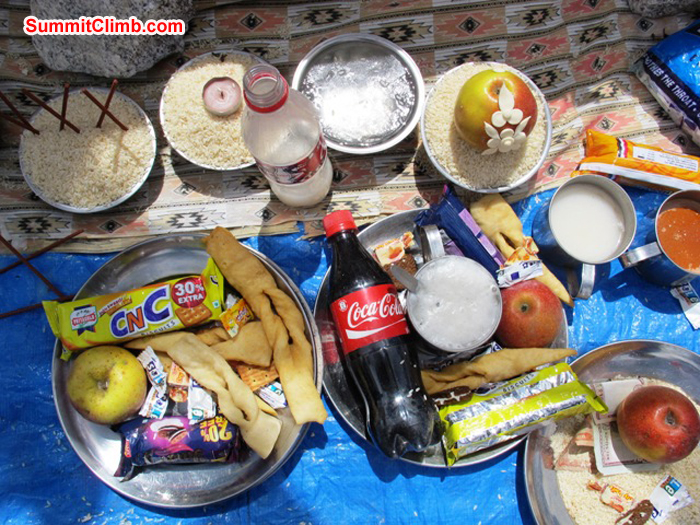 Delicious food and offerings at the basecamp blessing ceremony. Monika Witkowska Photo.