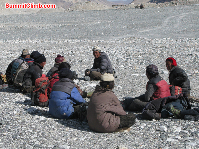 Yak drivers waiting for expedition load at Chinese base camp. Photo Rares Voda