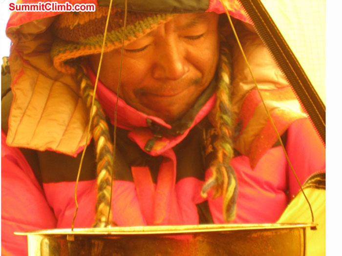 Kipa Concentrating on Cooking At Camp 3. Scott Smith. Kipa Concentrating on Cooking At Camp 3. Scott Smith.