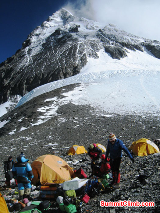 Mingma Sherpa, Jangbu Sherpa, Monika Witkowska, and Kieran Lally in the high camp at the South Col. Mt. Everest Summit in the background. Scott Smith Photo. Mingma Sherpa, Jangbu Sherpa, Monika Witkowska, and Kieran Lally in the high camp at the South Col. Mt. Everest Summit in the background. Scott Smith Photo.