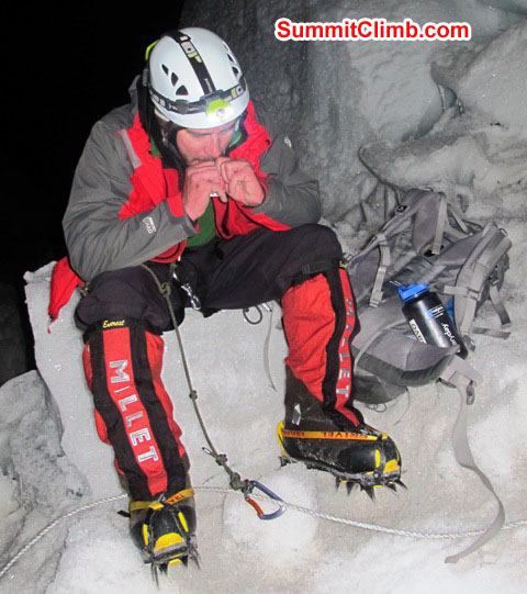 Slavomir Fila puts on his crampons at night at the 'crampon point' in the Khumbu icefall. Monika Witkowska Photo. Slavomir Fila puts on his crampons at night at the 'crampon point' in the Khumbu icefall. Monika Witkowska Photo.