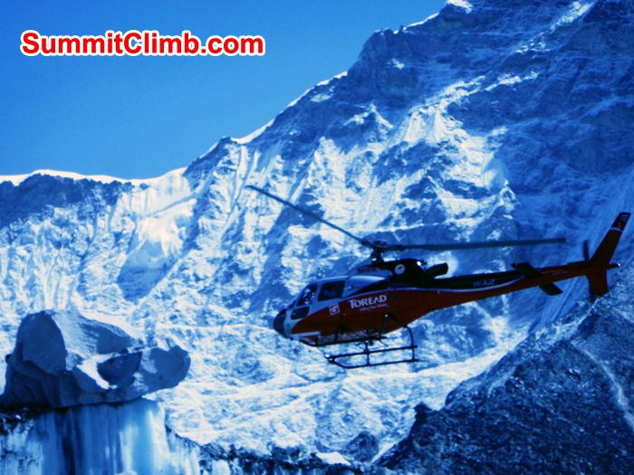 Helicopter taking off in basecamp. Mike Fairman Photo