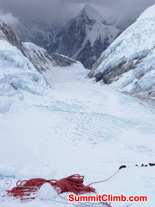 Mount Pumori and Western Cwm seen from camp 3 with rope fixing going on in foreground. Franz Ruehrlinger Photo