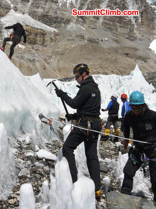 Team practices fixed rope climbing near basecamp on a sunny day. Mike Fairman photo. 