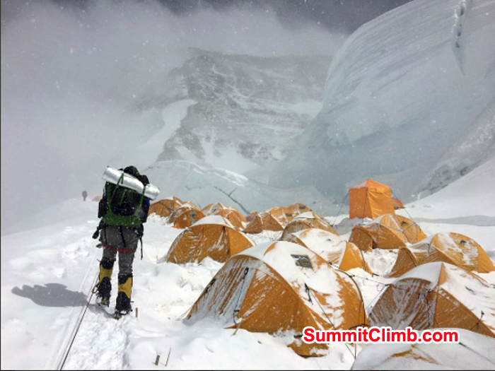 the North Col of Everest at 7,045m. The north ridge route can be seen through the clouds behind.