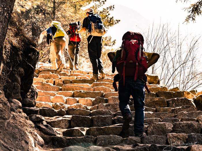 everest basecamp trekker hiking toward basecamp