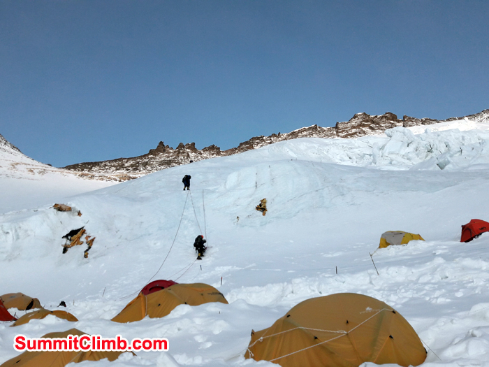 Tent lashed to its platform in camp