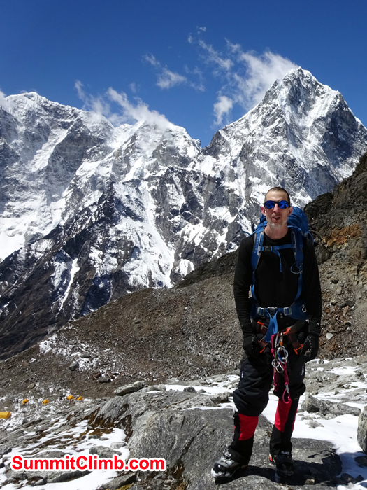 Travis posing for photo while doing everest glacier school